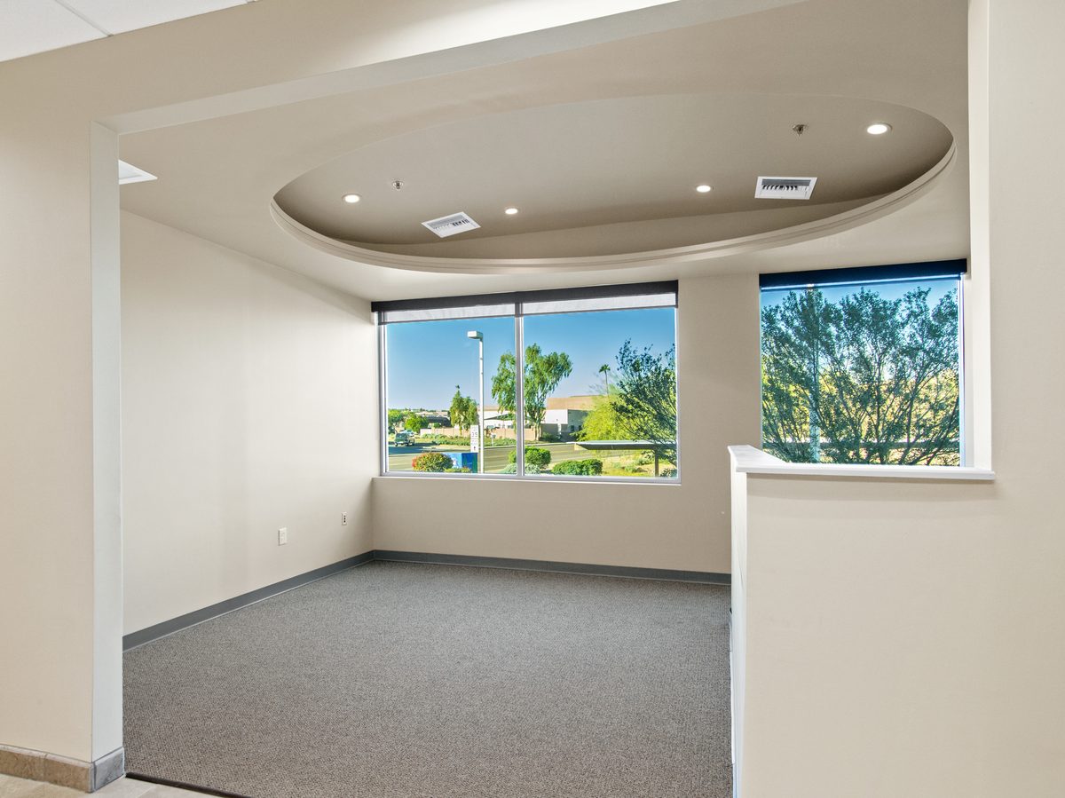 Suite 104: open area with feature ceiling